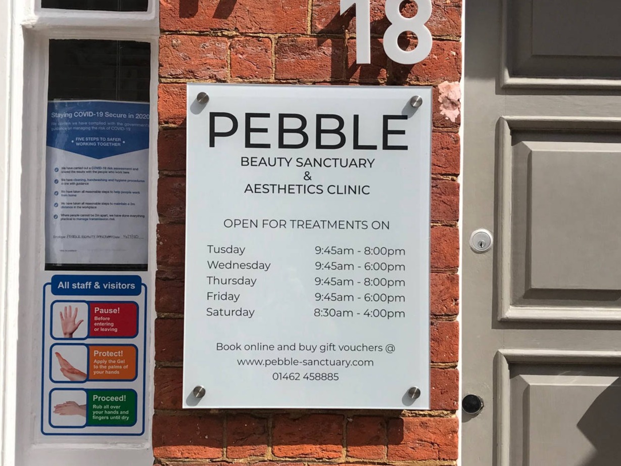 hair dresser opening times sign 